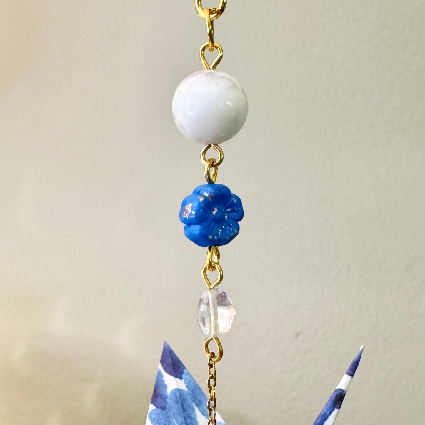 Origami Ornament #2148 - Small Crane with Glass Flower Bead