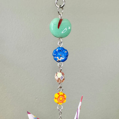 Origami Ornament #2446 - Small Crane with Ceramic Butterfly Bead