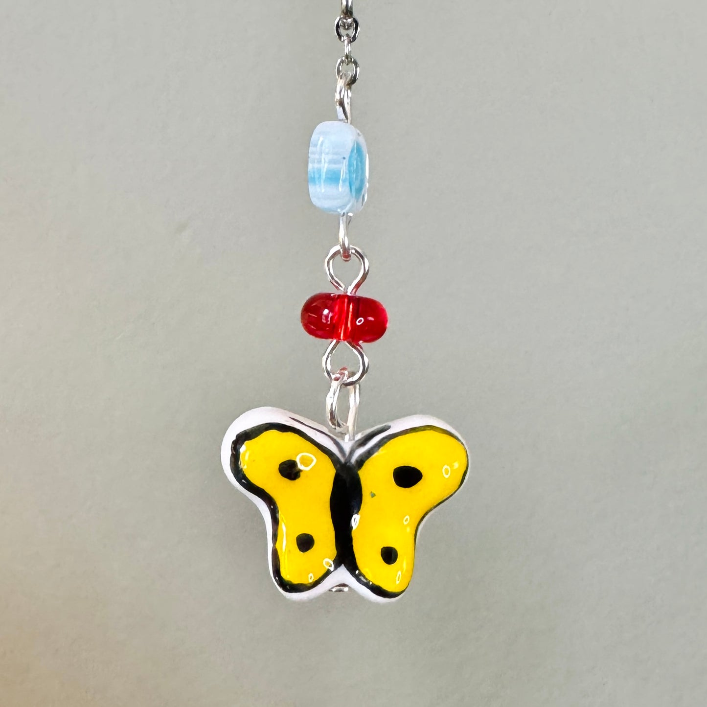 Origami Ornament #2446 - Small Crane with Ceramic Butterfly Bead